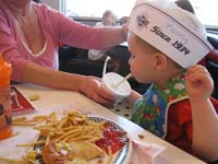 16-Kenny_finally_figures_out_how_to_use_a_straw_so_he_could_drink_his_milkshake