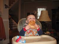 48-Kenny_eating_a_large_slice_of_pizza_until_he_reached_the_pepperoni