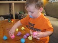 01-Kenny_playing_with_his_playdoh_Easter_eggs