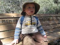30-dirty_pants_Kenny_resting_on_a_bench