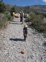 11-Kenny_is_thinking-well_Daddy_aren't_you_going_to_pick_up_my_water-while_Joel_Sierra_Rosa_and_Frank_watch