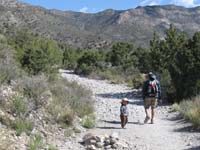 15-Kenny_checks_to_make_sure_Daddy_is_keeping_up-Leon_tags_with_Kenny