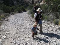 18-Daddy_holds_a_snack_in_his_hands-Kenny_stops_asks_for_some_then_move_on-almost_like_dangling_carrot,but_not