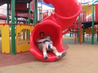 18-Daddy_and_Kenny_enjoy_the_tube_slide