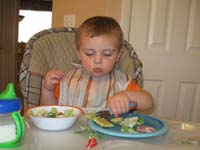 42-Kenny_uses_a_fork_to_eat_his_ravioli