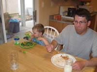 021-Daddy_and_Kenny_sitting_together_at_the_dinner_table