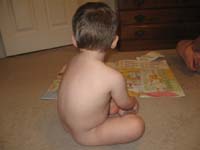 023-Kenny_reading_naked_waiting_for_the_need_to_go_potty