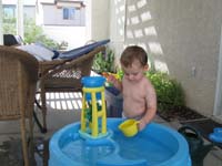 061-Kenny_learned_quickly_how_to_put_water_in_the_cup_and_then_the_tower