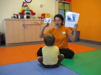 065-Kenny_is_learning_about_being_a_postal_worker_at_Gymboree