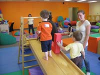 072-pushing_boxes_along_the_make_believe_conveyor_belt