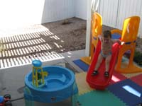 085-Kenny_enjoys_his_outside_slide
