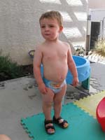 090-Kenny_is_proud-almost_looks_like_a_weight_lifter