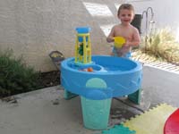 091-Kenny_is_happy_playing_with_the_water