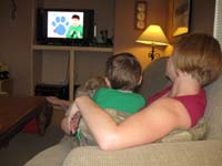097-Kenny_relaxing_with_Mommy_while_watching_Blues_Clues