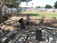 27-Kenny_admiring_Frankie_while_on_the_merry_go_round