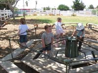 30-Kenny_and_Sierra_on_the_merry_go_round