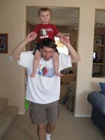 25-riding_Daddy's_shoulders