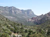 45-thrust_fault_visible-horizontal_layered_limestone_to_left-vertical_layered_sandstone_to_right