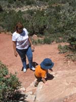 69-Kenny_showing_Jacque_how_to_scramble_up_the_sandstone