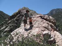 70-Daddy_helping_Kenny_scramble_up_a_big_rock
