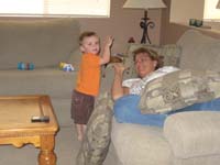 76-Jacque_relaxing_after_long_day-Kenny_gives_high_five