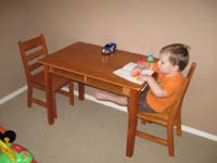 82-Kenny_enjoys_his_new_table_from_Grammy_and_Grampa_Duke_for_his_birthday