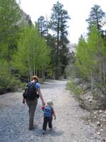 02-Kenny_holding_Mommy's_hand_on_the_trail