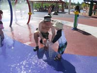 08-Daddy_and_Kenny_play_in_the_water