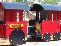 21-Kenny_plays_on_the_train_at_the_Springs_Preserve