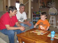 04-doing_the_shape_puzzle_with_Baba_and_Grandpa