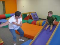 08-Baba_directs_Kenny_down_the_slide