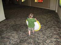 20-Kenny_walking_into_Paris_hotel-casino_with_his_donkey_float_ring_for_the_Ballys_pool