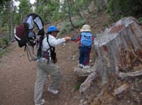 52-Daddy_helps_Kenny_hike_on_a_log