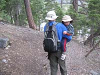 57-Grandpa_carries_Kenny_while_it's_hailing