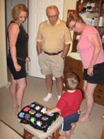 65-Grammy_and_Grandpa_Duke_greet_Kenny_in_his_room