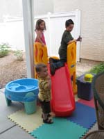 21-Sierra_Toby_and_Kenny_on_the_slide