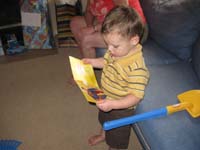 56-Kenny_likes_the_Superman_card_from_Baba_and_Grandpa