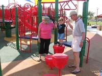 16-Grandpa_and_Baba_help_Kenny_take_big_steps