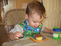 31-Kenny_admires_his_cupcake