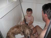 03-Kenny_helps_Daddy_wash_Baxter