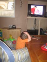 36-Kenny_reads_the_wild_animal_book_while_watching_Blue's_Clues