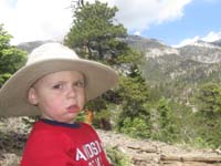 16-Kenny_looks_dorky_in_Daddy's_hat-he_wanted_to_trade_hats_with_Daddy