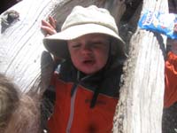 24-Kenny_climbing_in_the_wind_shelter