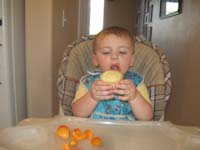 04-Kenny_eating_a_blueberry_muffin_he_didn't_care_much_for