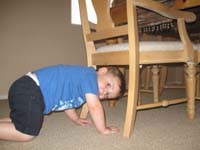 34-Kenny's_getting_bigger_but_still_fits_under_the_table