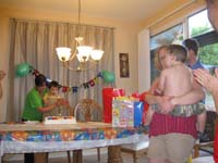 26-watching_Kayhan_blow_out_his_candles