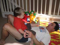 01-Kenny_and_Daddy_playing_on_the_floor