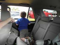 24-Kenny_watching_the_garbage_truck