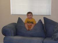 54-Kenny_wears_a_pathetic_face_while_Mommy_vacuums