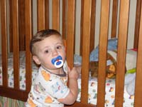 08-now_he's_reaching_for_another_pacifier